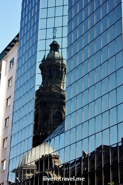 Great summary of the juxtaposition of old and new in Santiago: the Cathedral and a building across the street