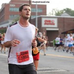 Cardiac Hill hath no mercy - a runner out at the Peachtree Road Race in Atlanta