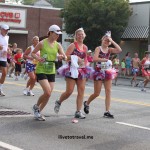 Happy runners show their spirit on the 4th of July at the Peachtree Road Race in Atlanta