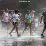 Runners after Cardiac Hill on a hot Peachtree Road Race in Atlanta
