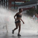 Runner cooling off during the Peachtree Road Race in Atlanta
