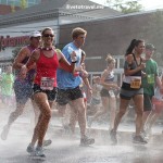 Runner cooling off during the Peachtree Road Race in Atlanta