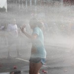 Runner cooling off during the Peachtree Road Race in Atlanta