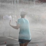 Runner cooling off during the Peachtree Road Race in Atlanta
