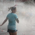 Runner cooling off during the Peachtree Road Race in Atlanta