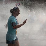 Runner cooling off during the Peachtree Road Race in Atlanta