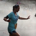 Runner cooling off during the Peachtree Road Race in Atlanta