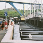 Queen Emma pontoon (floating) bridge with the Queen Juliana bridge in the background in Willemstad, Curacao