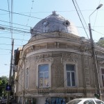 Overhead cable maze blocks beautiful building in Bucharest, Romania