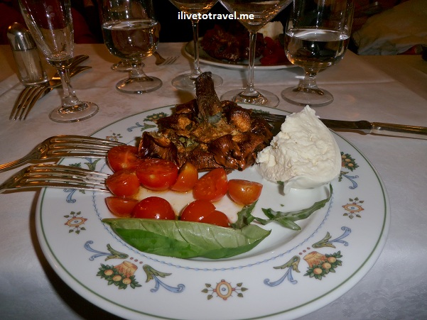 Rome, Italy food:  artichoke, buffalo cheese, tomato, basil