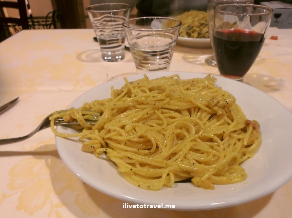 Carbonara and red wine in Rome, Italy