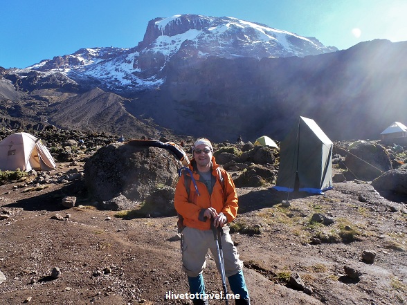  Hiker, Trekker in front of Mt. Kilimanjaro, Tanzania wearing Arcteryx