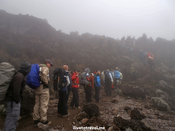 Rain hits while climbing Mt. Kilimanjaro in Tanzania