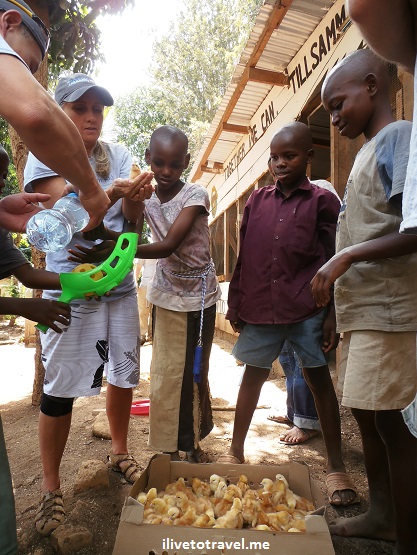 Trekkers and kids given the thirsty chicks some water upon their arrival at the Kili Centre